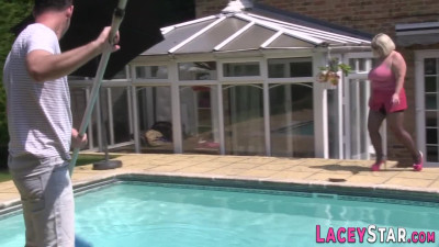 Bends to get fucked in the pool accompanied by blonde babe