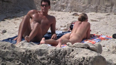 Amateur goes wild on cock at the beach