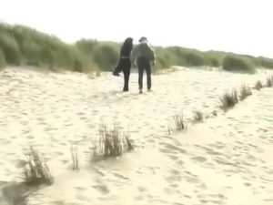 Smoking at the beach together with big ass babe