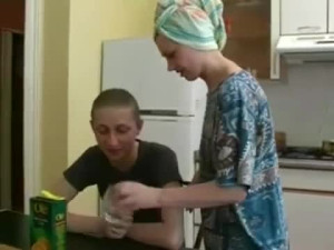 Sensual kissing in the kitchen